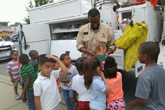 Journeyman Serviceman Danny Greenwood sparks interest in line work during a visit to Chicot Primary School.